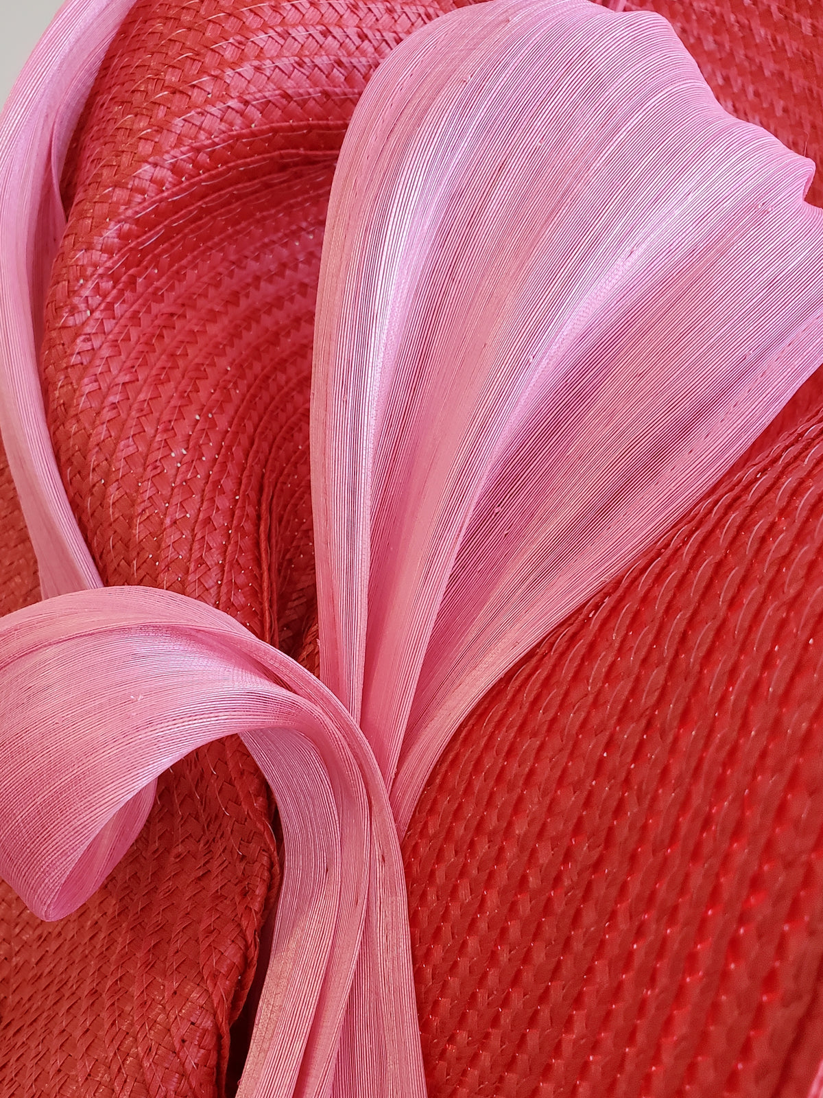 Red Fascinator Hat with Pink Ribbon Decoration